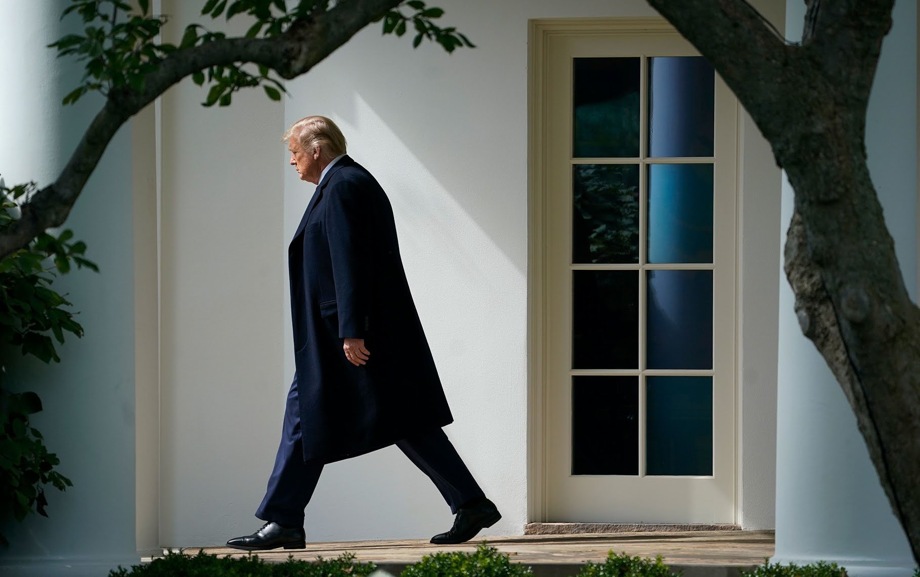 Then-President Donald Trump exits the Oval Office and walks to Marine One on the South Lawn of the White House on October 1, 2020.