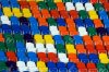 2813511-Several-rows-of-multi-coloured-plastic-stadium-seats-Stock-Photo.jpg